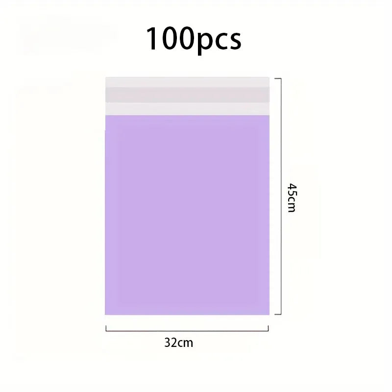 A rectangular purple waterproof self-adhesive courier mailer bag with a white top edge and a 32cm width and 45cm height.