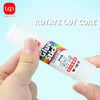 A hand is holding a white glue stick with colorful packaging, labeled PVA glue, for crafting.