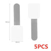 A set of five reusable adhesive cable ties with a white square and a gray cylindrical body.