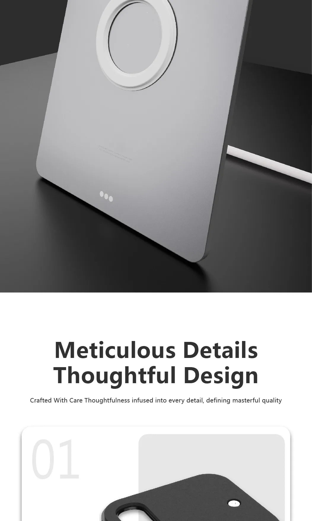 A close-up view of a silver foldable magnetic tablet stand with a circular cutout on a dark surface.
