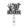 Silberner Acryl-Roter Schlüsselanhänger mit dem Text: Have the day you deserve