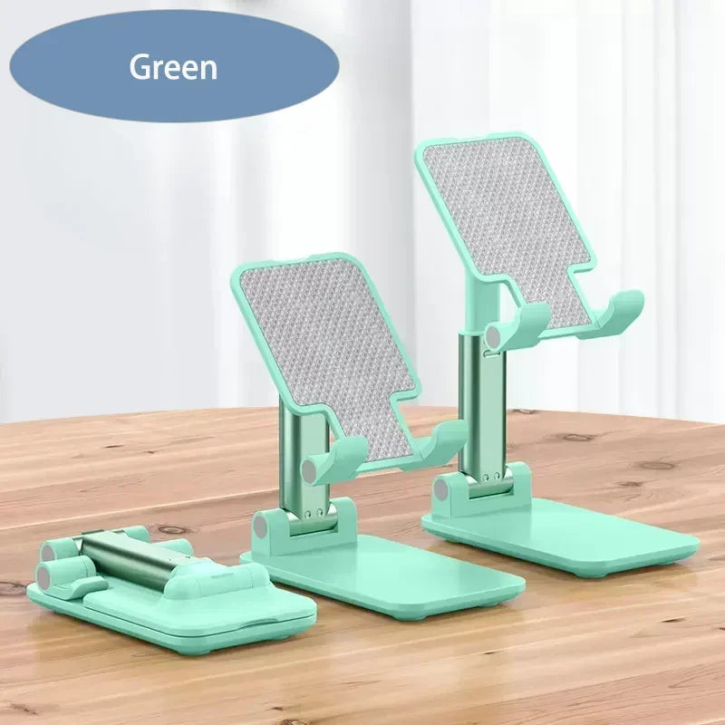 A green foldable adjustable phone holder stand with a padded cradle and support base.