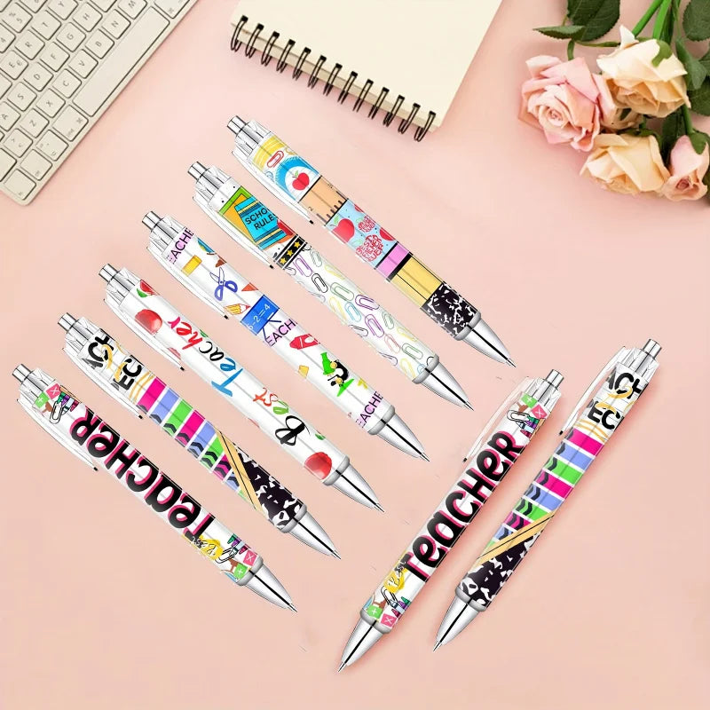 Set bunter Kugelschreiber mit Lehrer-Motiven auf rosa Hintergrund.
