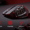 A close-up view of a black wireless MMO gaming mouse with programmable buttons and RGB lighting resting on a dark surface.