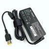 Black AC adapter for laptop, featuring a power cord and plug.