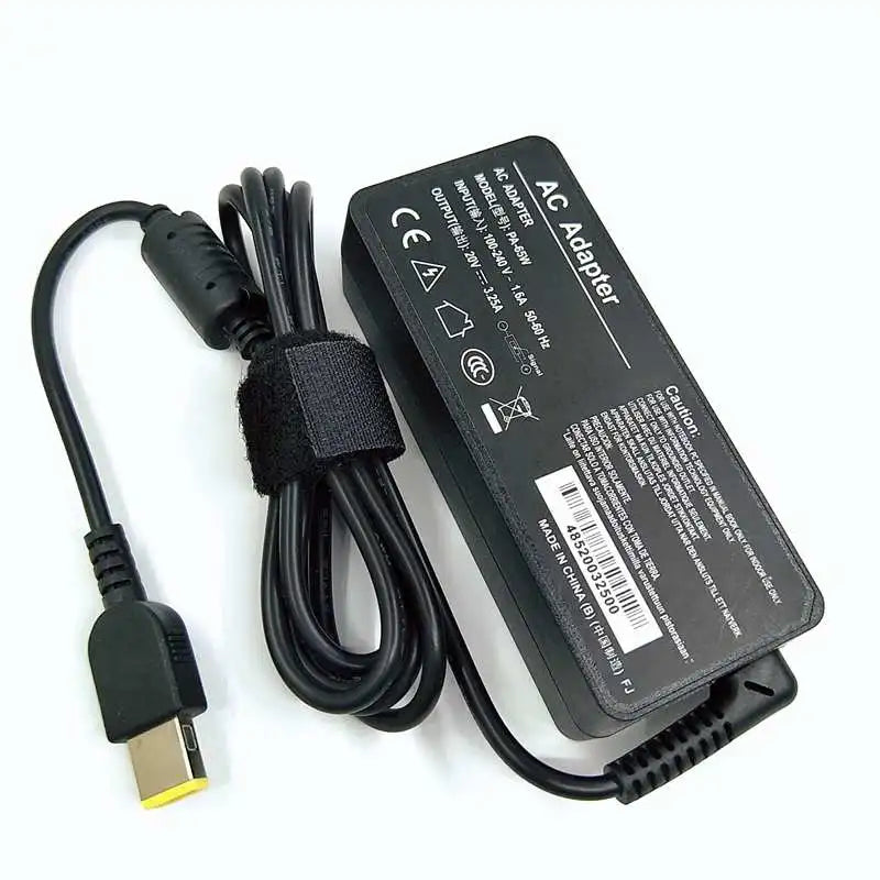 Black AC adapter for laptop, featuring a power cord and plug.
