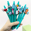 A hand holds a pack of six medical theme ballpoint pens featuring various medical symbols and text.