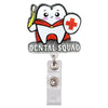 A cartoon tooth badge featuring a red cross and a yellow tool, attached to a clear retractable badge reel holder.