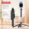 A black portable Bluetooth selfie stick tripod with a fill light and remote control is shown against a light background.
