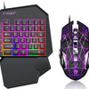 A black T-Wolf mobile gaming keyboard and mouse combo featuring purple and green LED backlighting.