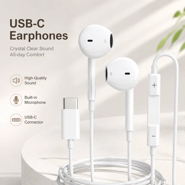 White USB-C earphones with a coiled cable and separate microphone components displayed on a white surface.