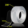 Roll of clear double-sided nano tape with a 15mm width and 1mm thickness shown on a dark background.