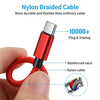 A hand holds a red nylon braided cable with a plug, showing its reinforced neck and nylon cable structure.