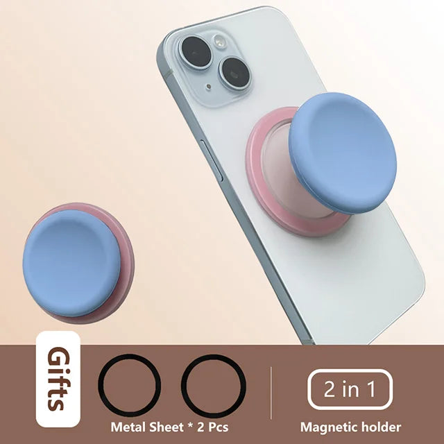 A white smartphone is shown with a pink silicone cover and a blue magnetic grip attached, demonstrating a 2 in 1 magnetic hol