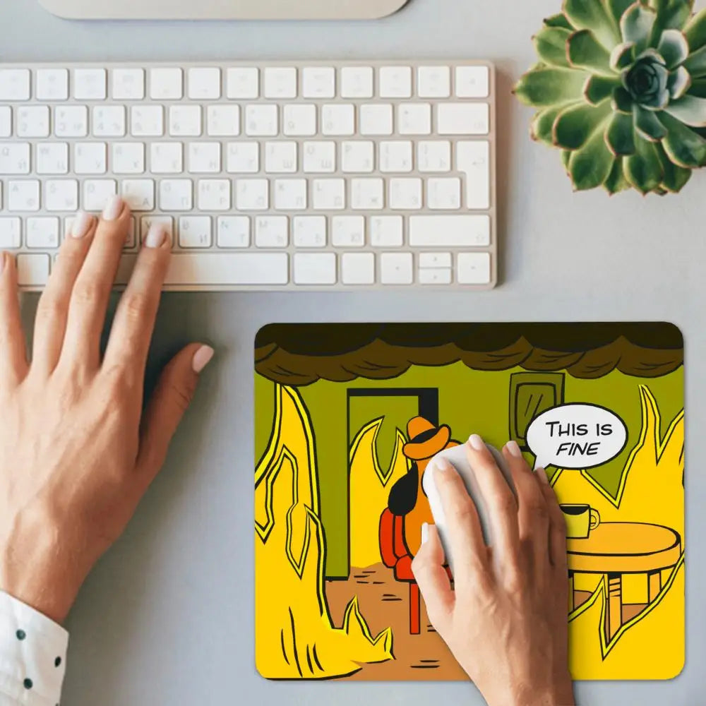 A hand is placing a gaming mouse pad featuring a cartoon dog in a yellow room onto a desk.