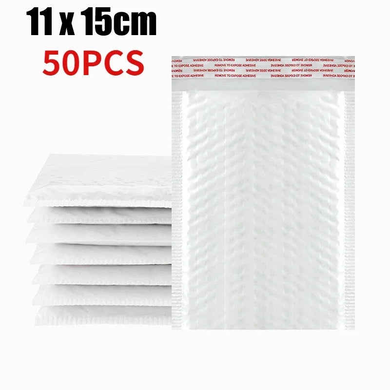 Stack of white self-sealing pearl film bubble shipping bags