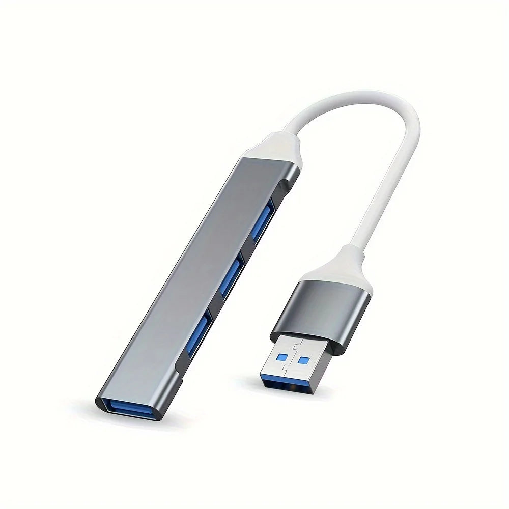 A silver USB 2.0 hub with a white cable and an OTG adapter plug.