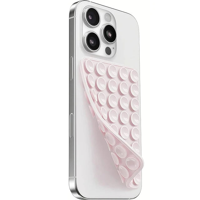 A white smartphone case featuring a pink silicone suction cup mount with a double-sided grip.