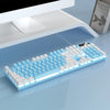 A light blue low profile wired gaming keyboard with a full numeric keypad is shown on a smooth surface.