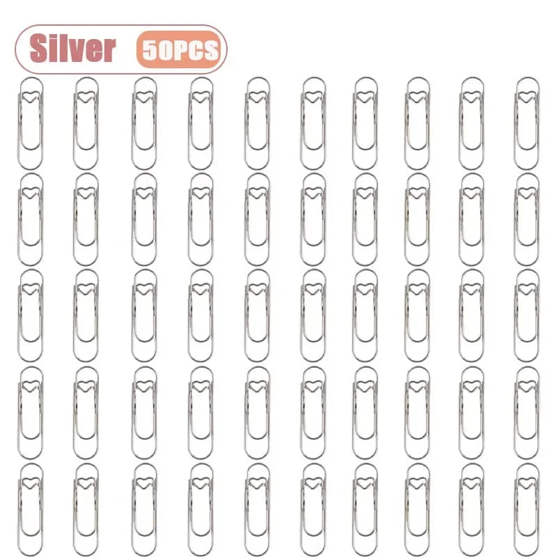 Silver metal pen clips for notebooks and journals, shown in a grid layout.