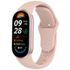 A pink silicone replacement strap for a smartwatch showing a digital display with time and activity metrics.