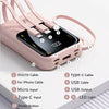 A pink multi-port power bank featuring multiple cables and a power button.