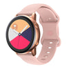 A pink silicone watchband with a round digital watch face displaying a heart icon and the number 89.
