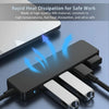 A black 4-port USB 3.0 hub adapter with heat dissipation arrows shown next to a laptop.