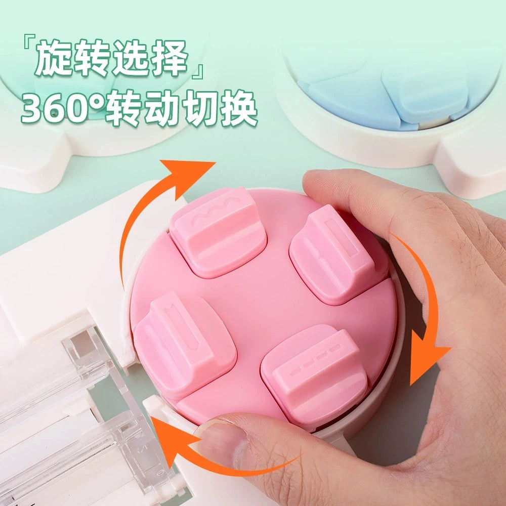 A hand is operating a pink rotary paper cutting machine with 360-degree rotation to cut paper.