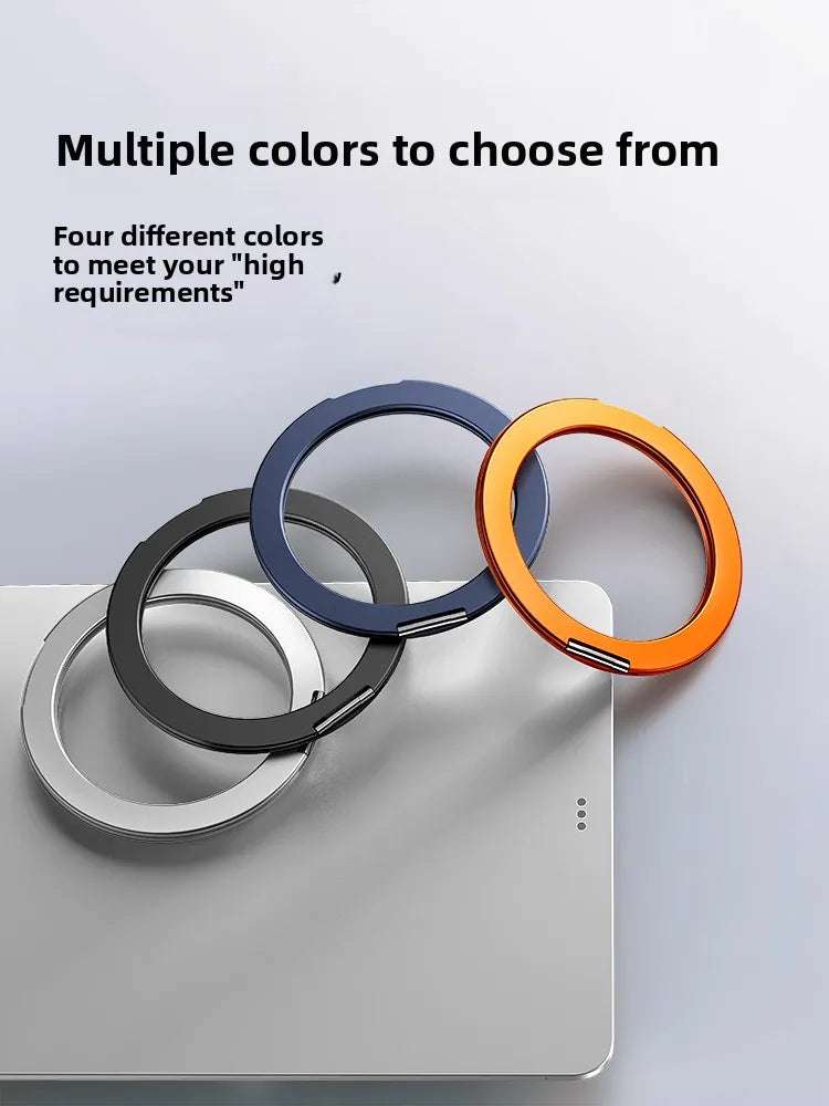Four colored magnetic tablet holders displayed on a gray surface.