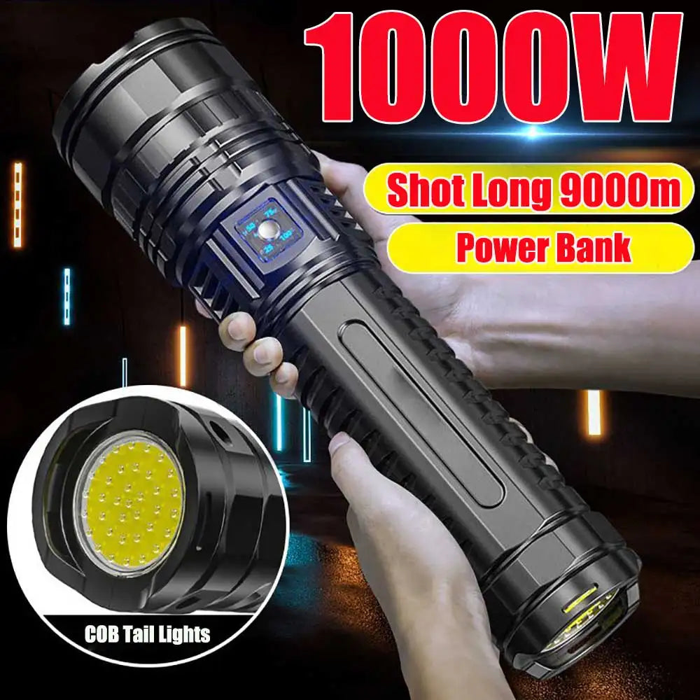 A hand holds a black tactical LED flashlight with adjustable zoom and visible COB tail lights.