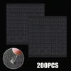 Feuille de points décoratifs adhésifs noirs avec un échantillon circulaire montrant l'adhésif double face amovible.