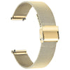 A close-up of a gold-toned Milanese loop watch band with a quick release clasp.