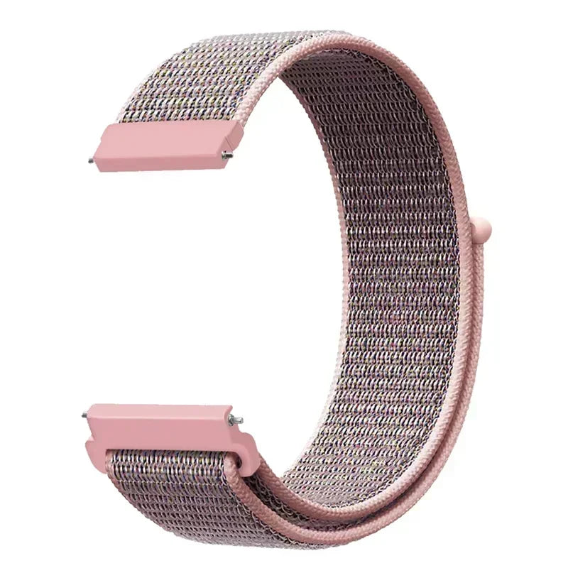 A pink nylon loop watch strap with a textured band and pink buckles is shown in a curved shape.