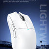 A white Lightweight Design gaming mouse is shown against a dark, rugged background.