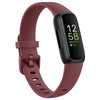 A maroon silicone replacement strap for a Fitbit Inspire series watch with a black display case.