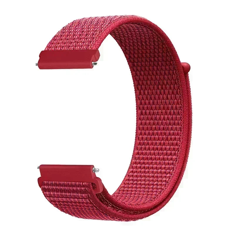 A close-up view of a red woven nylon watch strap with a buckle, showing the texture and adjustable loop.