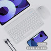 A white 10-inch Bluetooth keyboard and mouse combo with a rechargeable battery shown next to a smartphone.