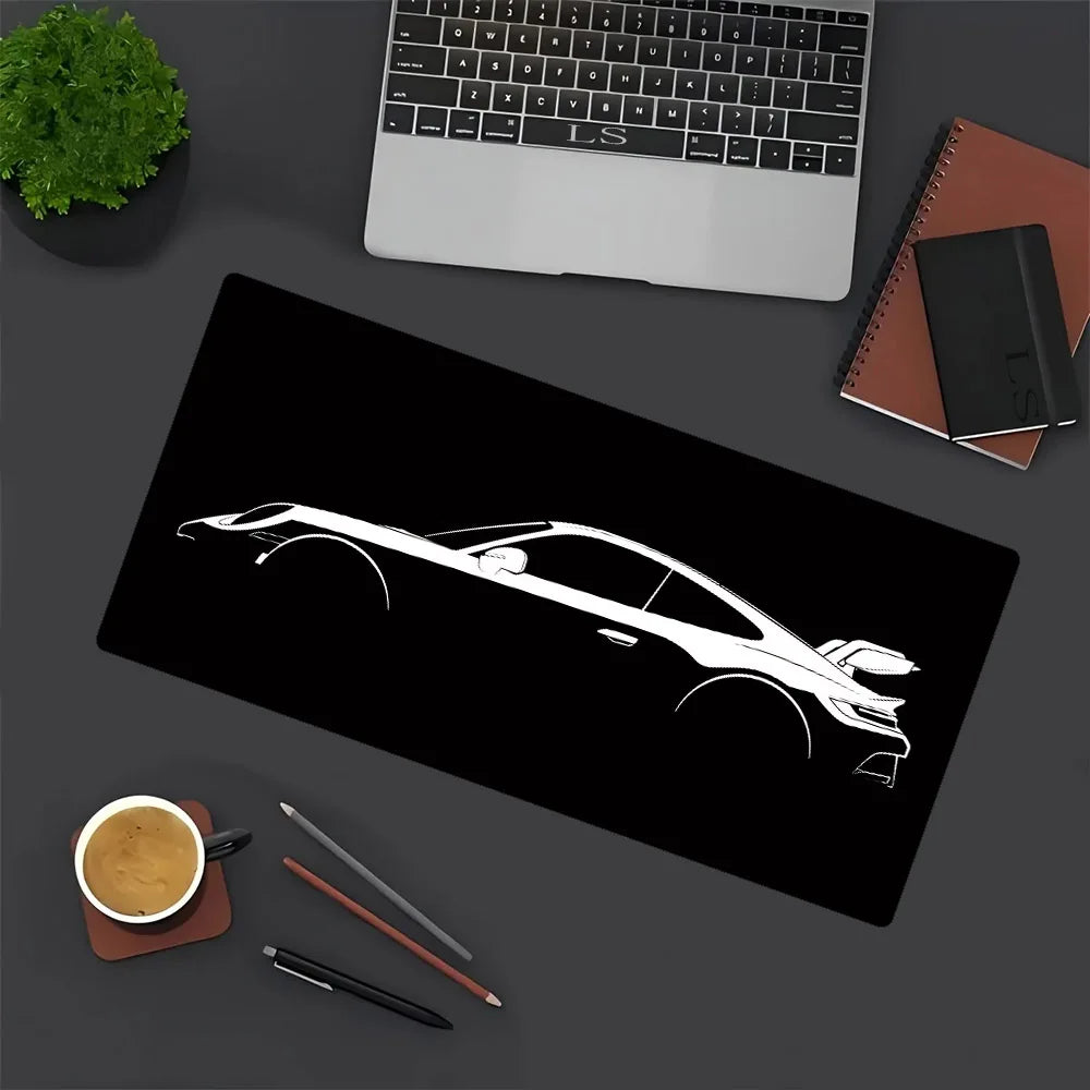 A black mouse pad featuring a white silhouette of a JDM car design on a dark gray surface.