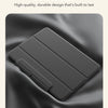 A black magnetic folio case for an iPad Air shown in a close-up, angled view against a dark background.