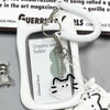 A white crystal clear card holder with a cat silhouette charm attached to a white cord keychain.