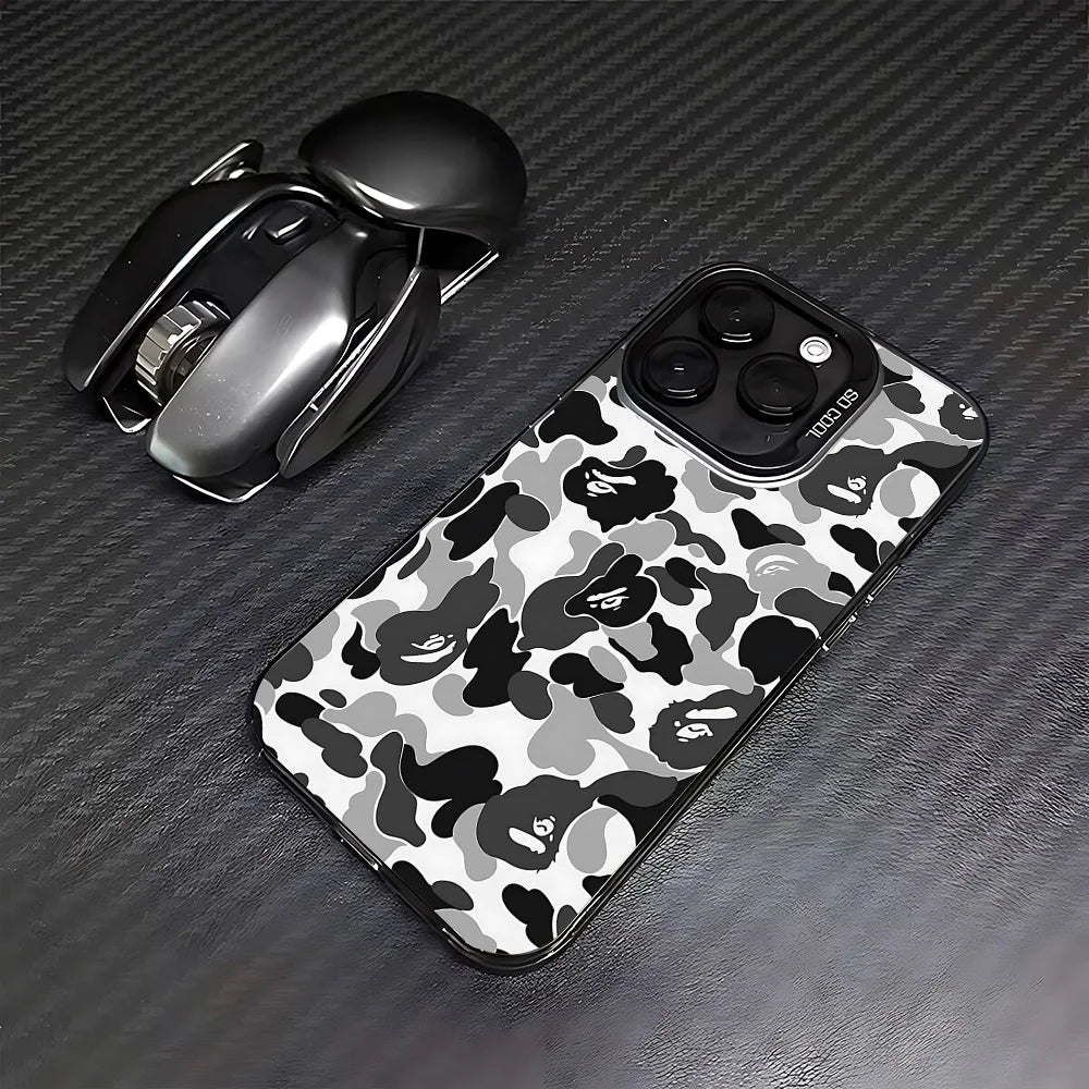 A black leopard print anti-fall phone case for an iPhone is shown next to a black Apple AirPods case.