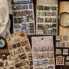 A collection of retro 3D relief book gallery stickers and scrapbook elements featuring various books and decorative items.
