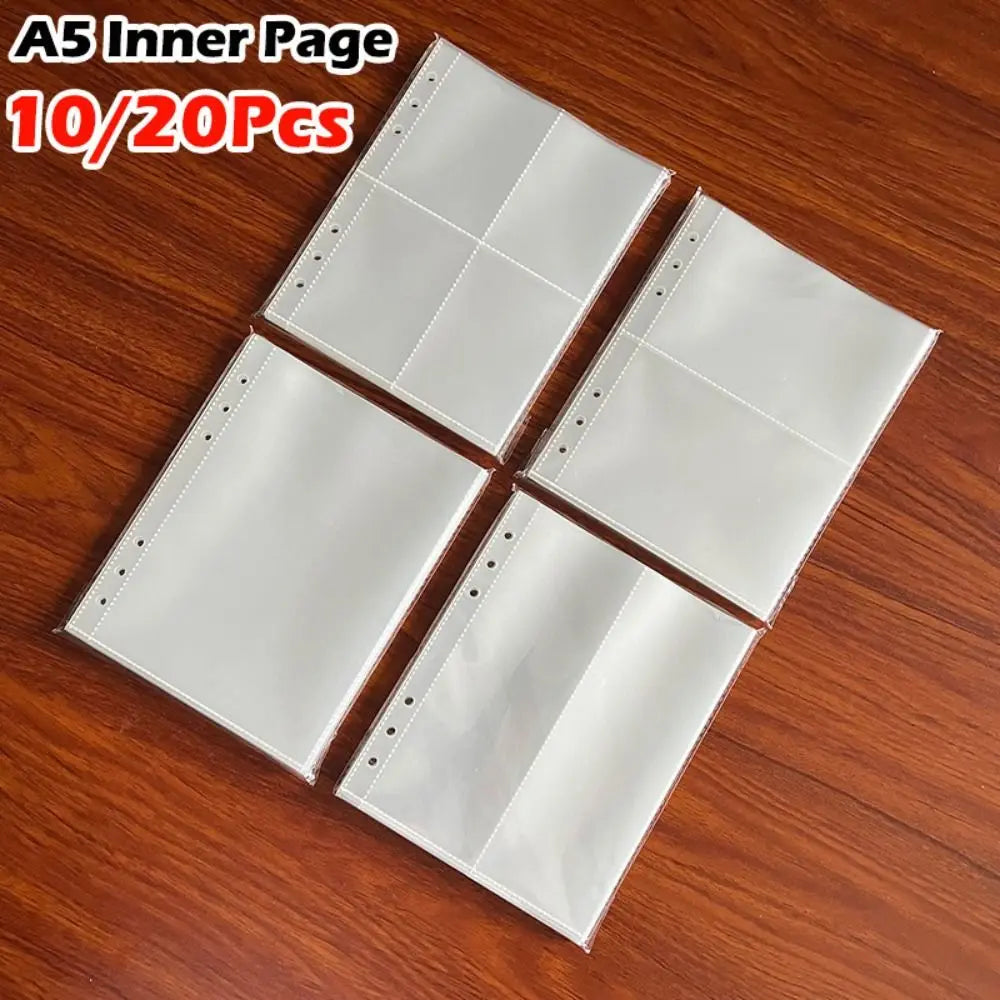 A stack of ten A5 inner page photo card binder sleeves on a wooden surface.