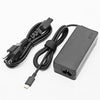 A black universal 65W USB-C laptop charger with a cable and power adapter.