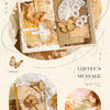 A vintage paper craft kit featuring layered papers, dried flowers, and natural elements for scrapbooking.