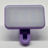 A purple portable rechargeable mini selfie light with a rectangular translucent body and a small clip.