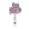 Pink leopard print acrylic badge holder with a silver clip.