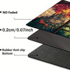 A stack of gaming mouse pads showing layers including a stained glass art print, a 0.2cm thick layer, and a rubber anti-slip 