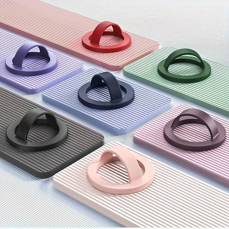 A collection of magnetic silicone phone grips in various colors and finishes displayed on a white surface.